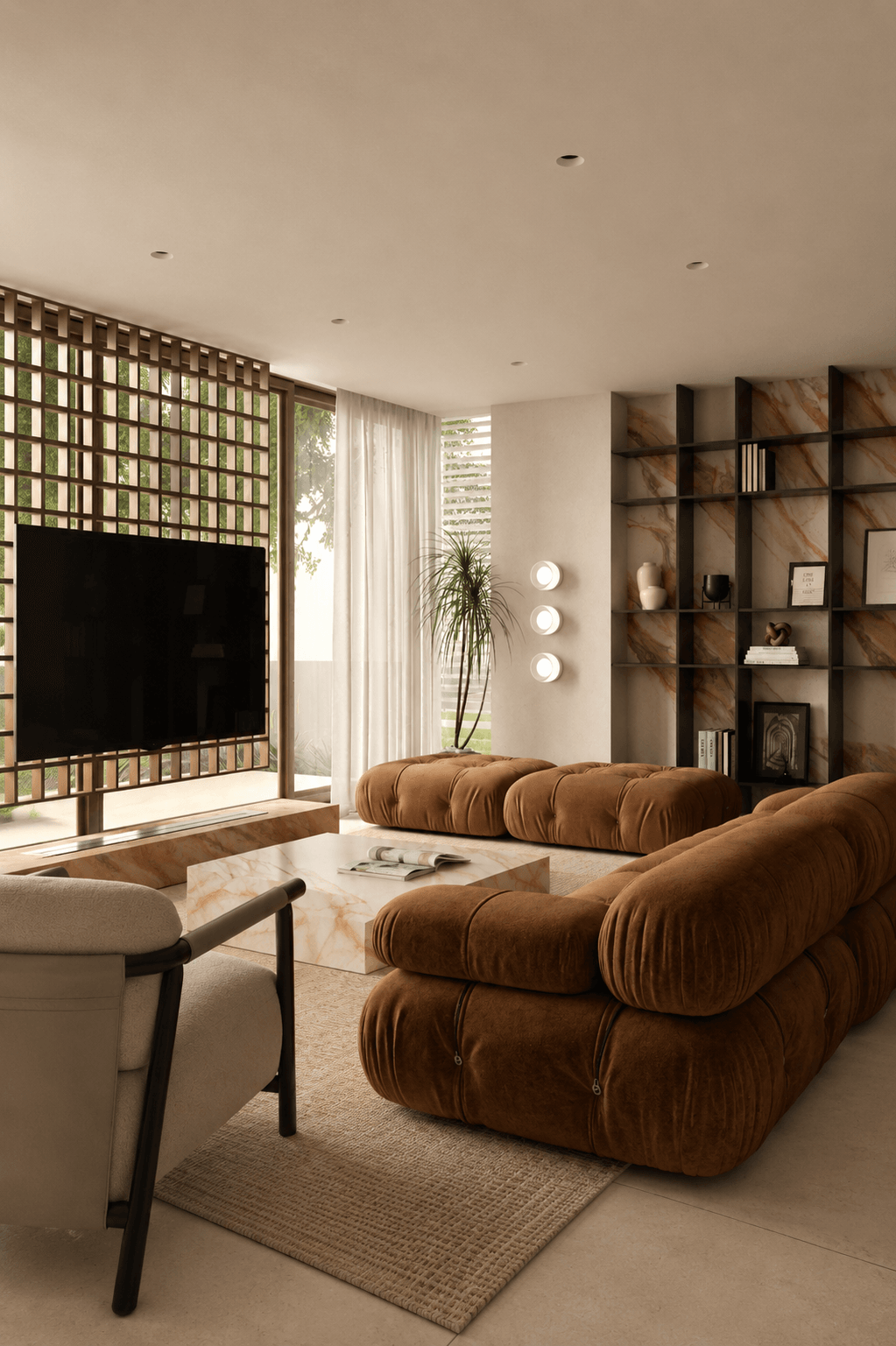 Sunlit living room with a brown sofa, woven rug and glazed doors